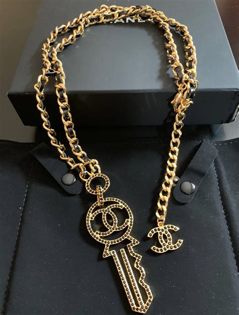 chanel key necklace|More.